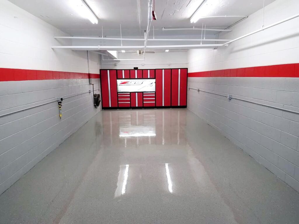 a commercial garage with fresh paint and a new floor coating