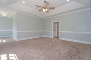 Room with repaired drywall and fresh paint